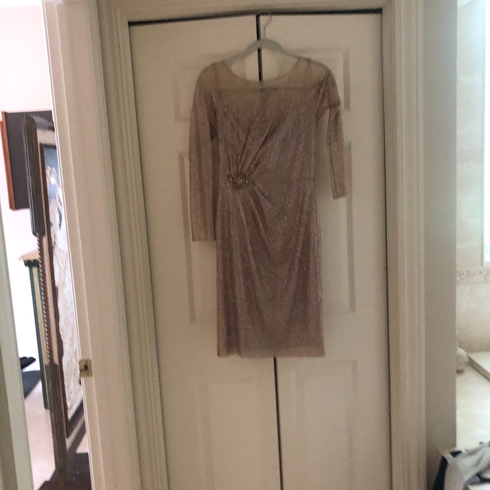Gorgeous Sparkly dress. Very flattering